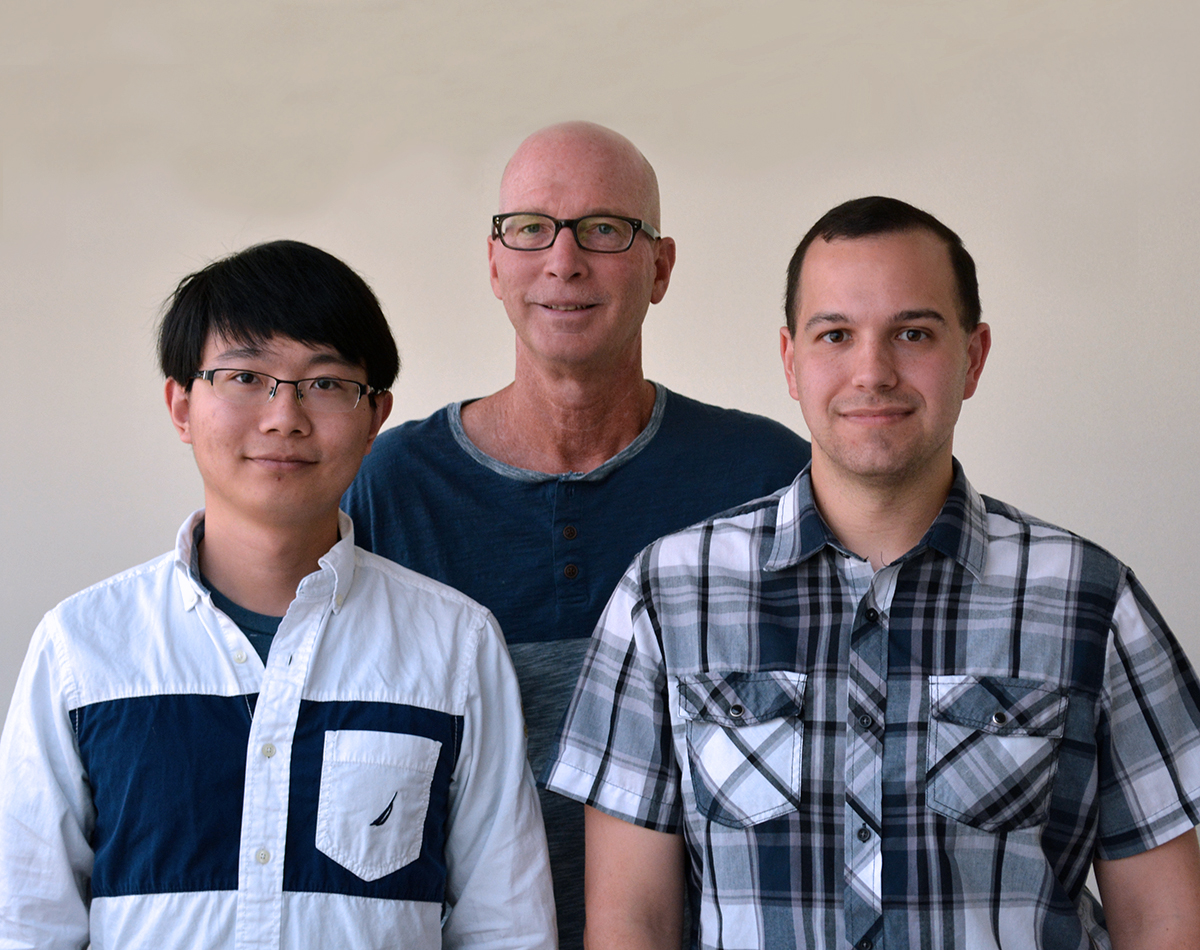 Scripps Research Institute Professor Kim Janda (center), Graduate Student Song Xue (left) and Research Associate Joel Schlosburg were authors of the new paper.