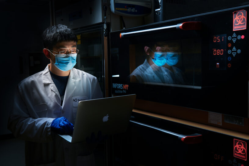A Scripps Research scientist in the lab