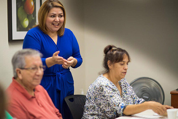 Woman running a workshop.
