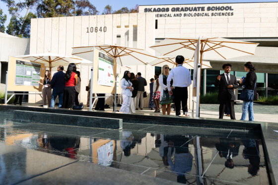 Poster presentations in a courtyard.