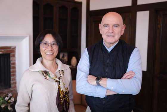 Scripps Research donors couple smiling together in a home interior setting