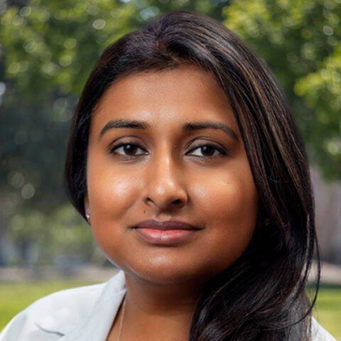 Professional headshot of Dr. Stuti Jaiswal wearing a white lab coat.