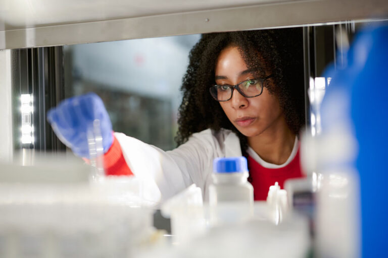 scientist examining scientific instruments